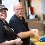 Penn Mar Employee making Sandwhiches