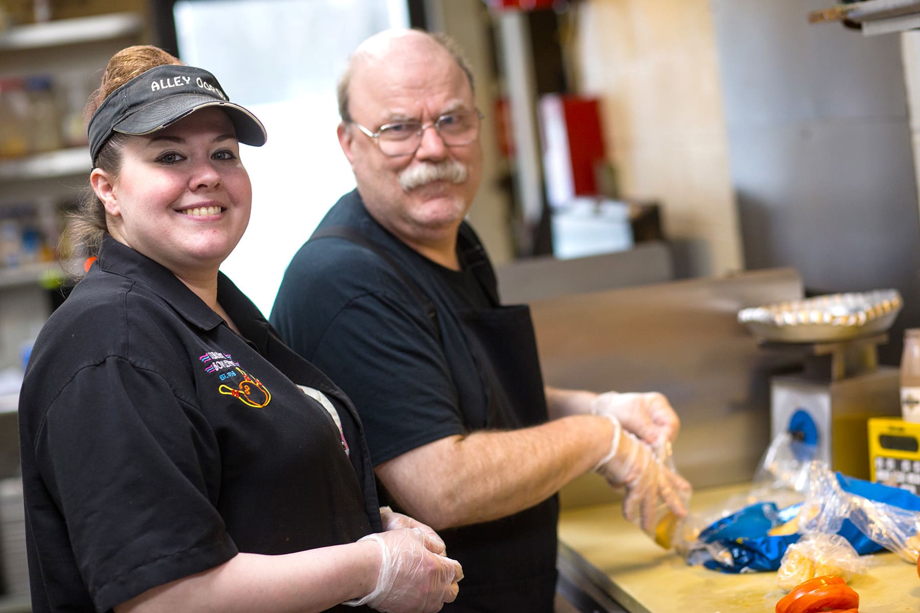 Penn Mar Employee making Sandwhiches