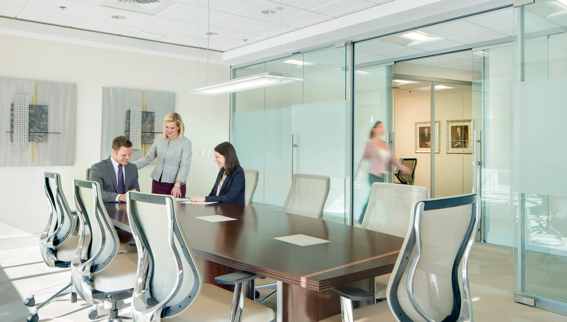 Ellin and Tucker employees in a meeting collaborating.